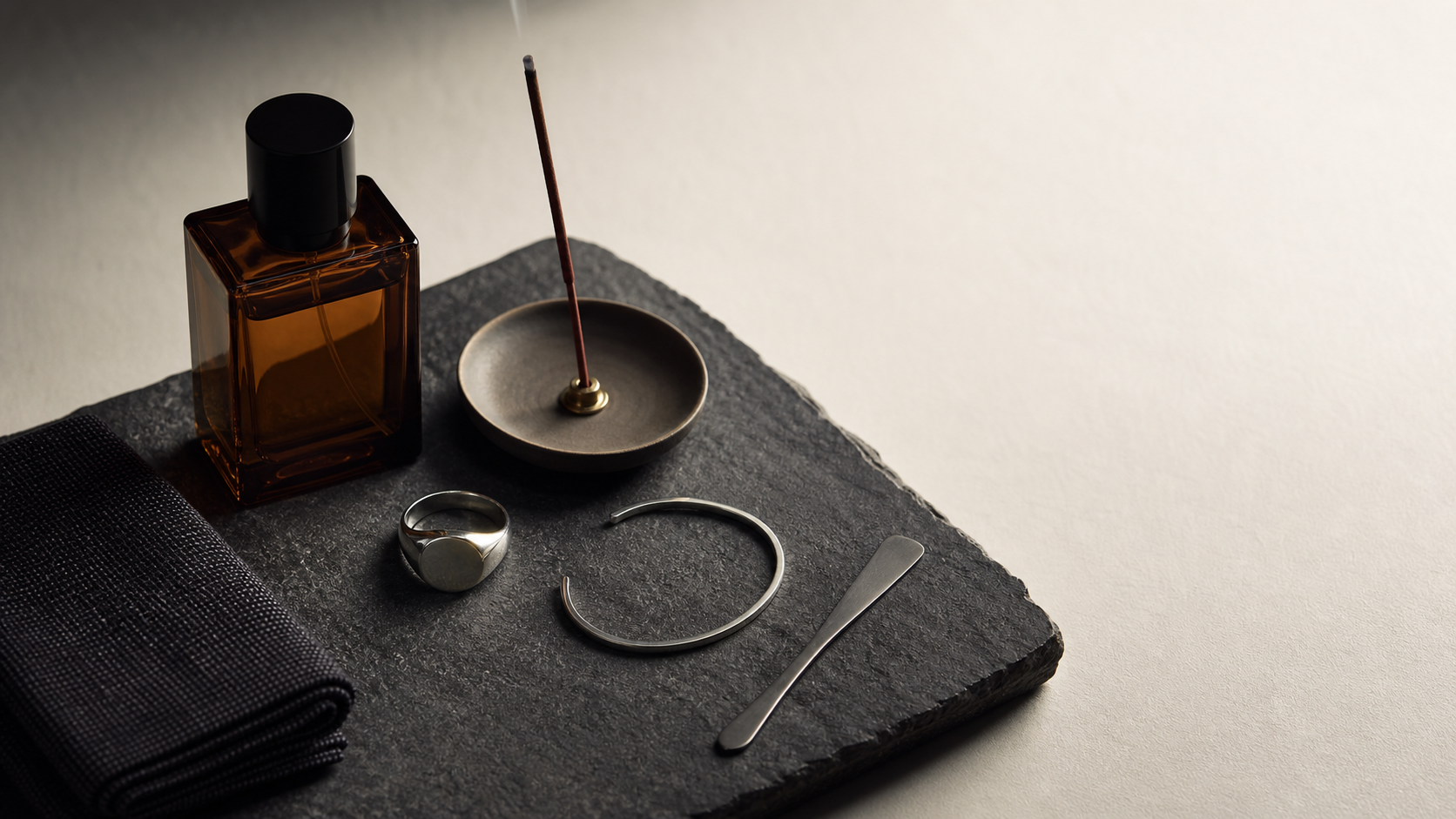 Incense, fragrance, and jewelry still life